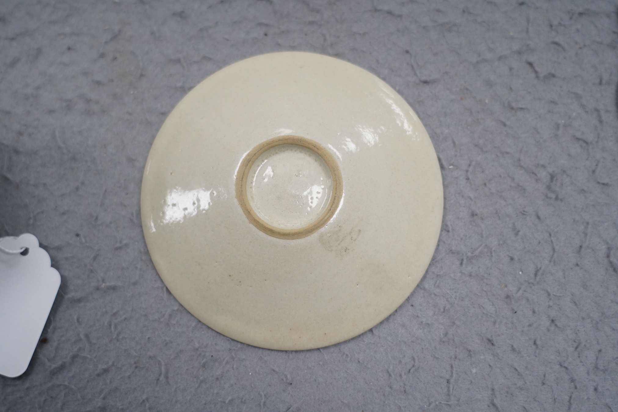 Dame Lucie Rie D.B.E. (1902-1995), a manganese glazed coffee cup and saucer